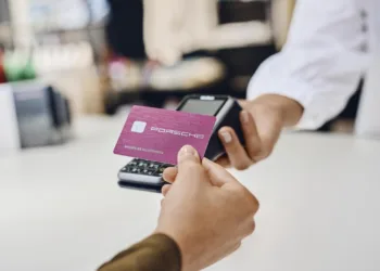 Metal Porsche Card issued with travel perks and charging access