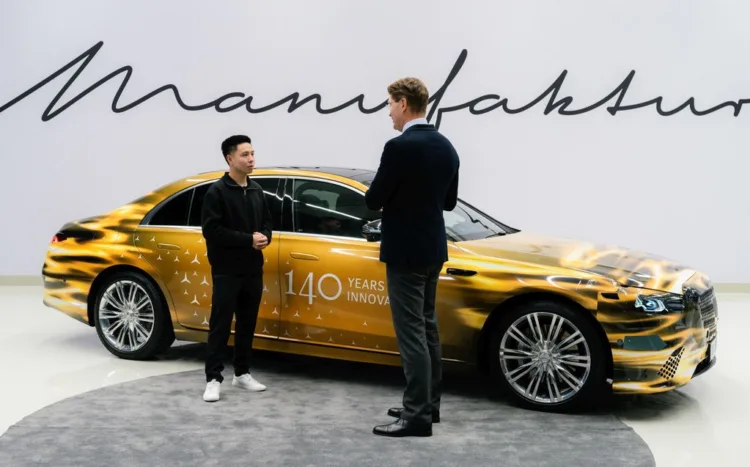 Ola Kallenius and Justin Tse.