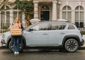 Claire with baguettes and Renault 4.