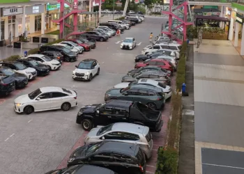 Busy car park in Rawang, Selangor, Malaysia.