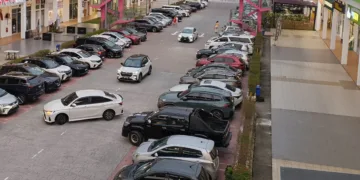 Busy car park in Rawang, Selangor, Malaysia.
