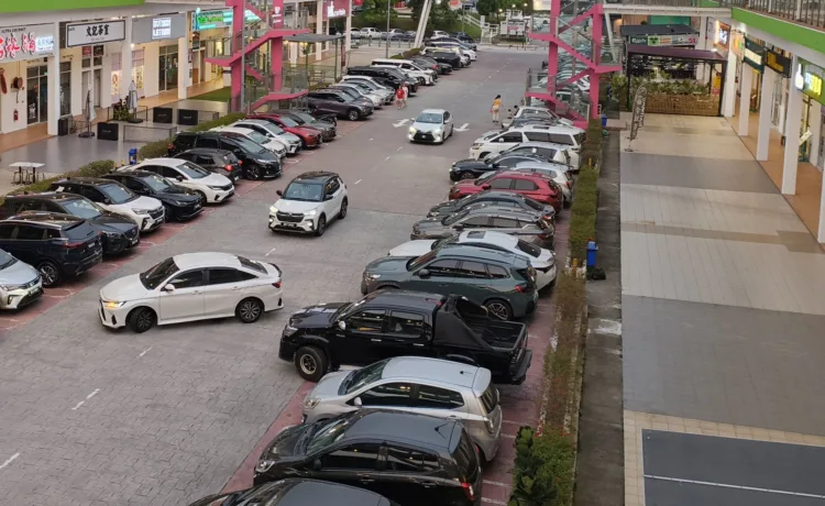 Busy car park in Rawang, Selangor, Malaysia.