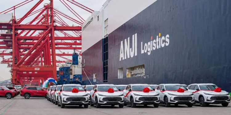 SAIC's fleet logistics operator Anji with new cars.
