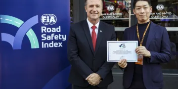 Mikhito Kojima receiving the award for Honda.