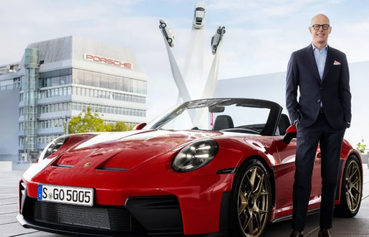 Porsche CEO Dr Michael Leiters with the 911 GT3 SC.